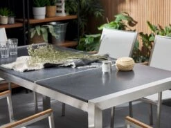 Conjunto De Jardín Mesa Con Tablero Negro De Piedra Natural 180 Cm, 6 Sillas Blancas GROSSETO 14 Conjunto De Jardín Mesa Con Tablero Negro De Piedra Natural 180 Cm, 6 Sillas Blancas GROSSETO -Beliani undef src sa picid 764218 type whitesh image