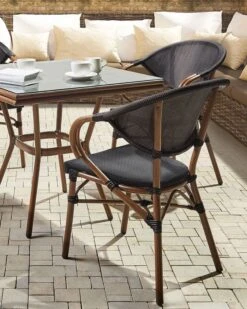 Conjunto De 4 Sillas De Jardín Negro/madera Oscura CASPRI 14 Conjunto De 4 Sillas De Jardín Negro/madera Oscura CASPRI -Beliani undef src sa picid 799044 type whitesh image